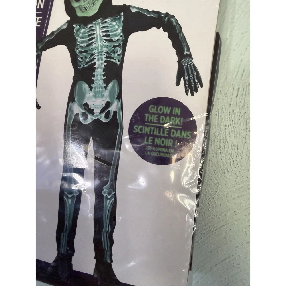 Halloween glow-in-the-dark skeleton costume in size medium (8–10) JUMPSUIT ONLY